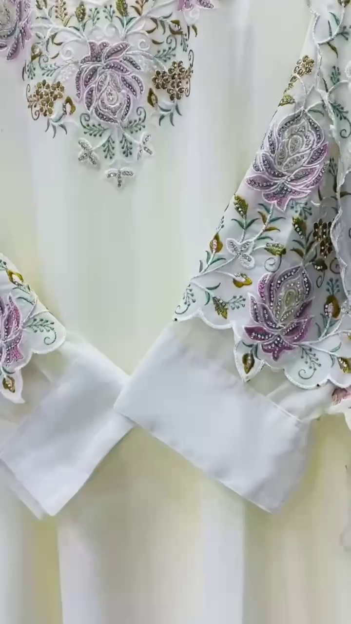 Elegant White Embroidered Kurti